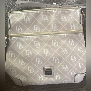 Dooney and Bourke Crossbody logo’d  handbag.